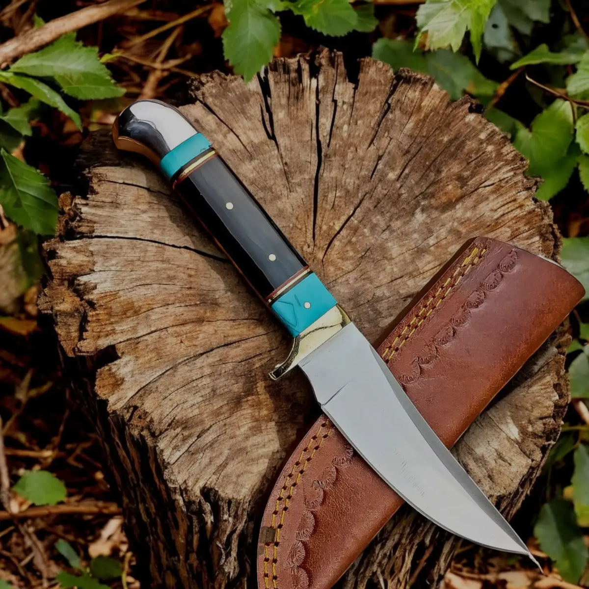 Handmade engraved Damascus-style folding pocket knife with bone handle and leather sheath from Golden Knives collection
